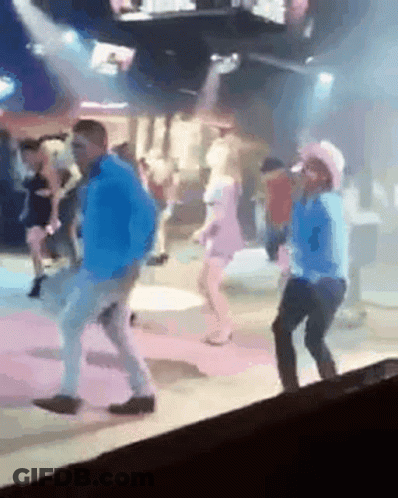 Dancing Couple On Club Stage GIF