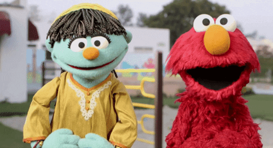 Dancing Elmo Together With Raya In The Street GIF
