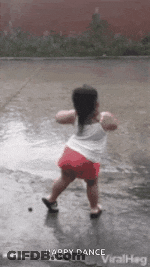 Dancing Girl Outside In The Rain GIF