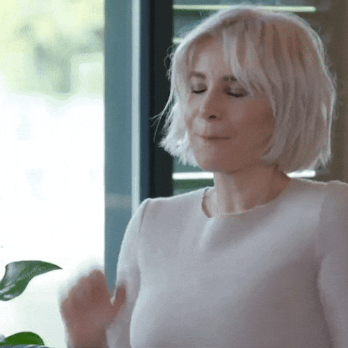 Dancing Girl Pumping Her Hand Upward GIF