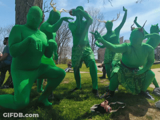 Dancing Green Men In Costume GIF