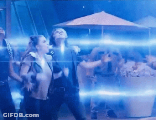 Dancing In Dark Room With Blue Lights GIF