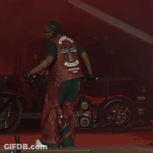 Dancing Man In Red Leather Vest And Sunglasses GIF
