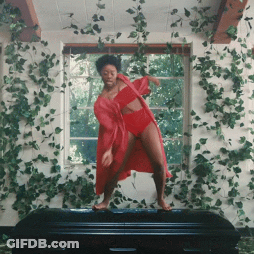 Dancing Men Carrying Coffin GIF
