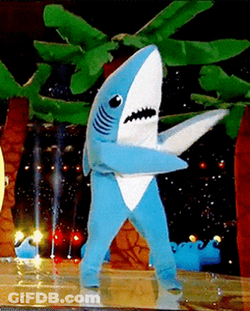 Dancing Shark Mascot On The Stage GIF