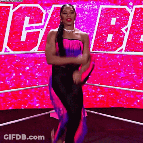 Dancing Woman In Wrestling Ring Pink Blue Dress GIF