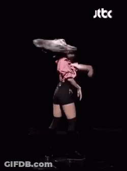 Dancing Woman With Microphone Pink Shirt Black Shorts GIF