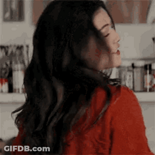 Danielle Campbell Looking Back And Smiling GIF