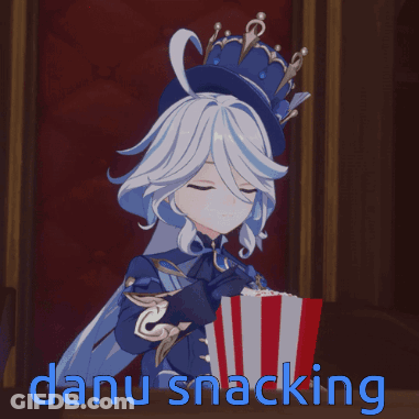Danu Snacking Is Written On A Picture Of A Girl Holding A Popcorn GIF