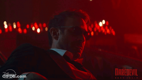 Daredevil Poster Man In Suit And Sunglasses GIF