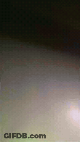Dark Background With Spots Of Light GIF