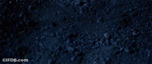 Dark Blue Background With Rocks And Dirt GIF
