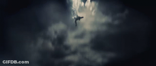 Dark Cloudy Sky Over Buildings GIF