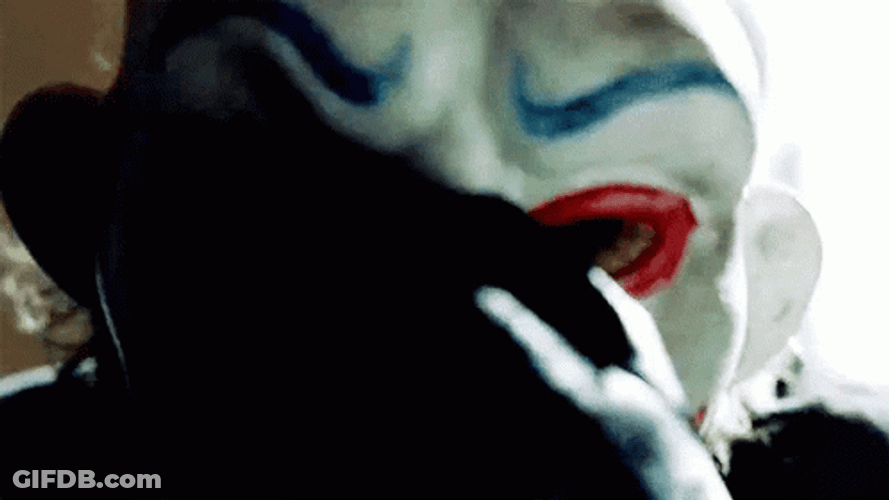 Dark Knight Joker Removing Mask GIF