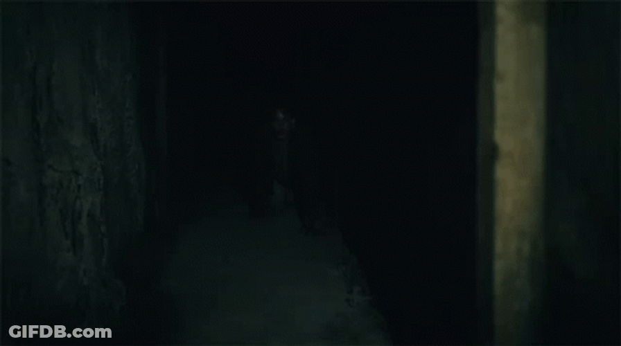 Dark Place With Crawling Man GIF