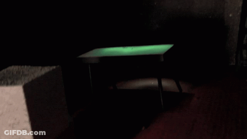 Dark Room With Chair And Ladder GIF