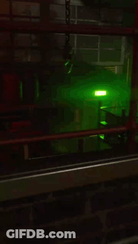 Dark Room With Green Light Through Window GIF