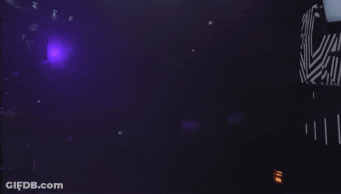 Dark Room With Purple Ceiling Light GIF