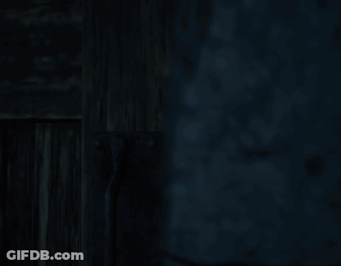 Dark Room With Wooden Shelf And Brick Wall GIF