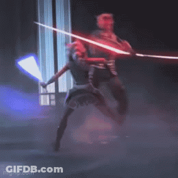 Darth Maul And Ahsoka Tano Are Fighting With Lightsabers In A Dark Room . GIF
