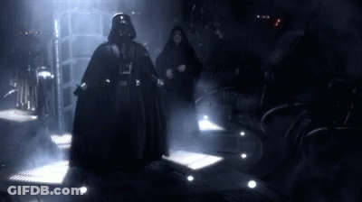 Darth Vader And Emperor Palpatine Are Standing In A Dark Room With Smoke Coming Out Of It . GIF
