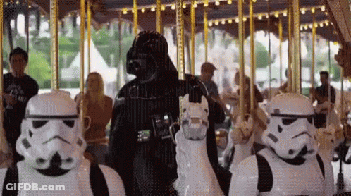 Darth Vader And Stormtroopers On Merry Go Round GIF