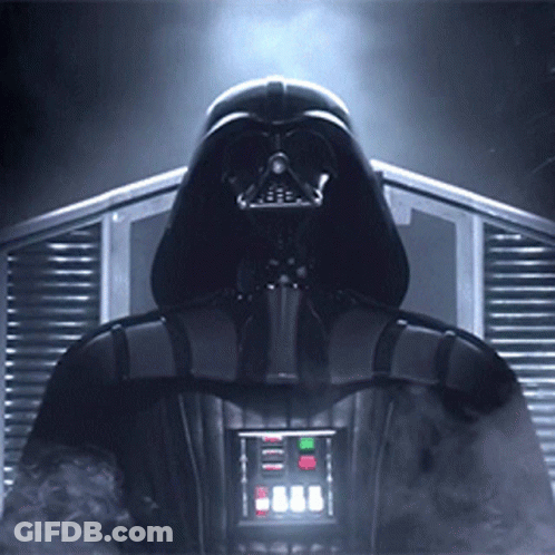 Darth Vader From Star Wars Is Surrounded By Smoke And A Light GIF