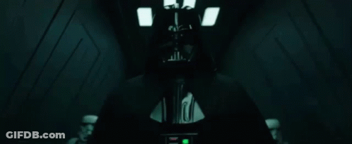 Darth Vader Giving Middle Finger In Dark Hallway GIF