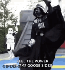 Darth Vader Is Dancing With Stormtroopers In The Background . GIF