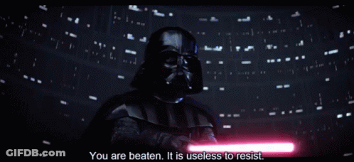 Darth Vader Is Holding A Red Light Saber And Says You Are Beaten It Is Useless To Resist GIF