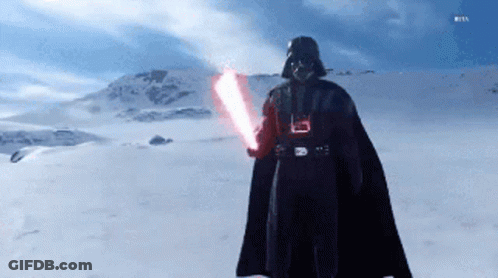 Darth Vader Is Holding A Red Light Saber In A Snowy Field GIF