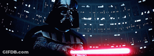Darth Vader Is Holding A Red Light Saber In Front Of A Dark Background GIF