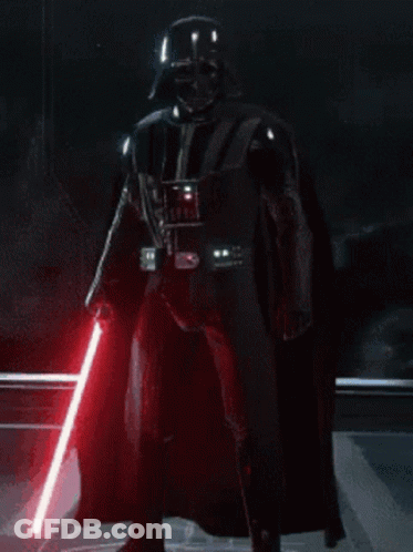 Darth Vader Is Holding A Red Lightsaber In A Dark Room GIF