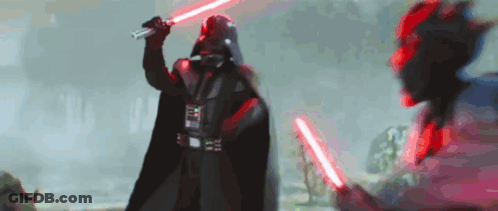 Darth Vader Is Holding Two Red Lightsabers In His Hands GIF