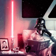 Darth Vader Is Reading A Book While Holding A Light Saber GIF