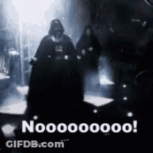 Darth Vader Is Standing In A Dark Room With A Group Of People And Says No . GIF