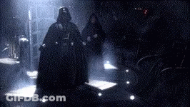 Darth Vader Is Standing In The Dark In A Room GIF