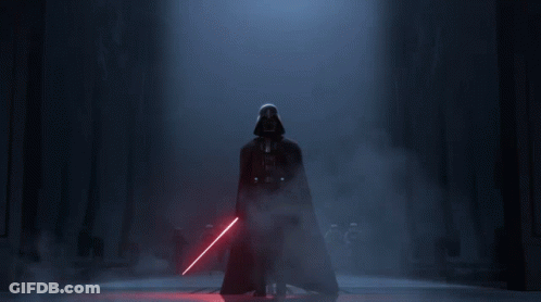 Darth Vader 'S Face Is Shown In A Dark Background GIF