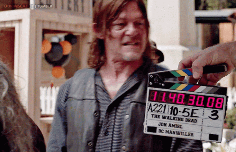 Daryl Dixon Biting Hand GIF