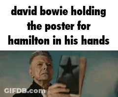 David Bowie Holding Hamilton Poster GIF