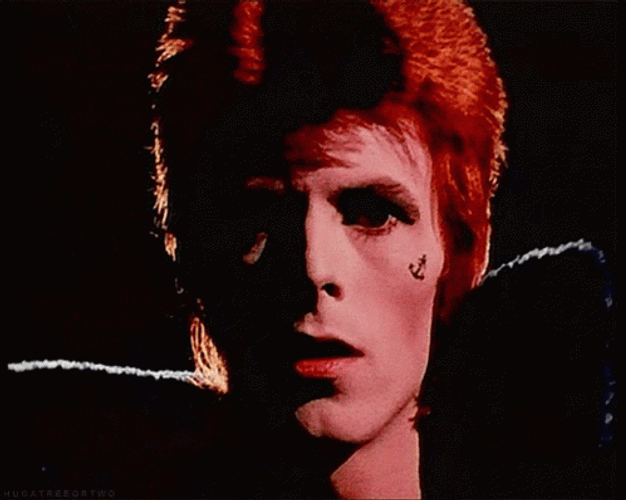 David Bowie Red HAir Tattoo On Cheek GIF