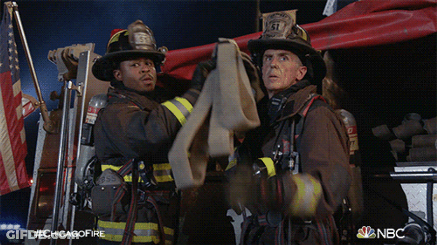David Eigenberg Holding Fire Hose GIF