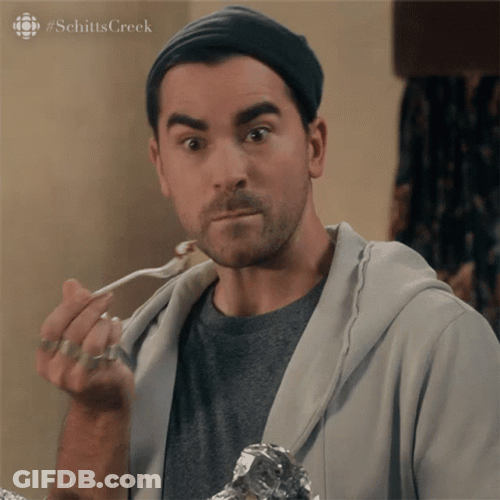 David Rose Nibbling Schitts Creek GIF