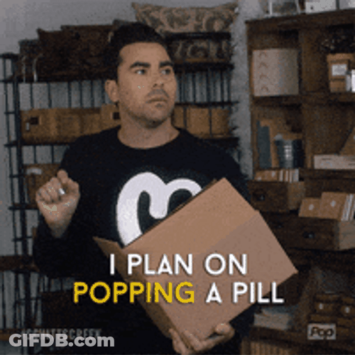 David Rose Popping A Pill GIF