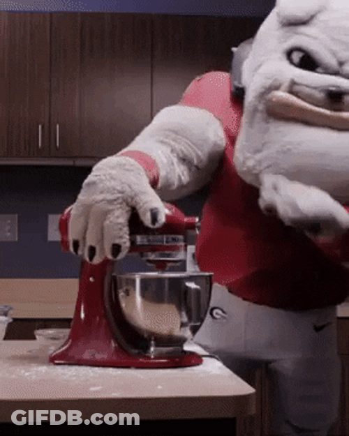 Dawgs Mascot Turning On Electric Mixer GIF