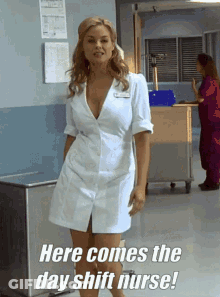 Day Shift Nurse Standing In Hallway GIF