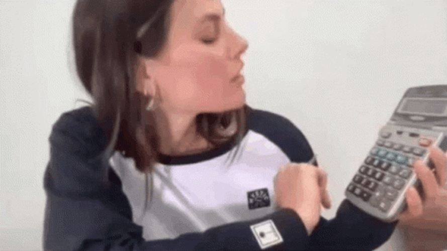 Dayane Mello Typing In Calculator GIF