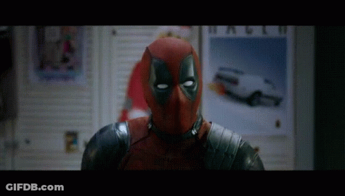Deadpool Costume Man In Front Of Wall Poster Saying So GIF
