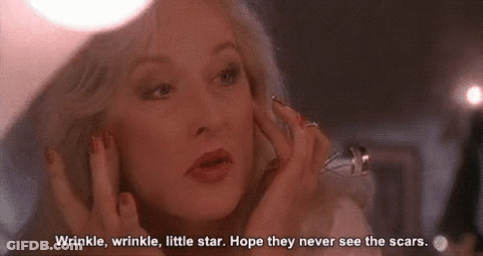 Death Becomes Her Madeline Ashton Looking At Wrinkles GIF