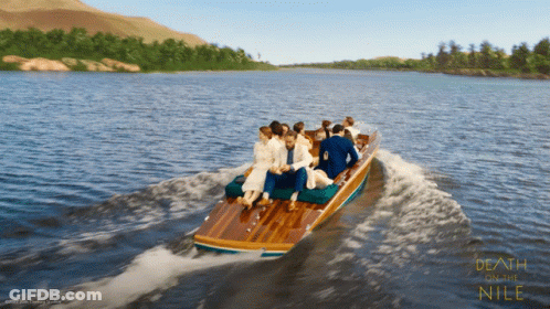 Death On The Nile Poster With Boat Full Of People GIF